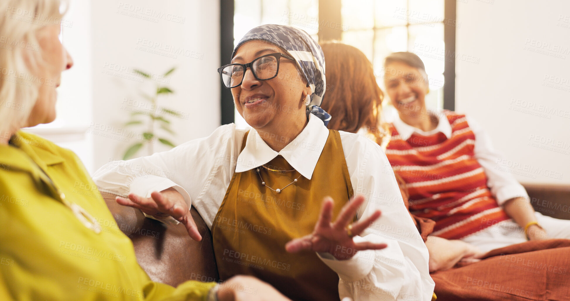 Buy stock photo Friends, gossip and old women on couch, home and happy for discussion, laugh and together in lounge. Senior people, conversation and humor for funny joke in living room, relax and break in apartment