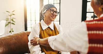 Buy stock photo Elderly woman, friends and smile with comfort, support or empathy for trust in retirement home. Senior, female person or discussion with chat for care, friendship or social bonding together in house