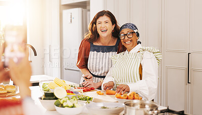 Buy stock photo Happy women, picture and kitchen with vegetables for meal prep, memory or friends cooking in home. Female people, group or smile with photography, ingredients or recipe for food, gathering or capture