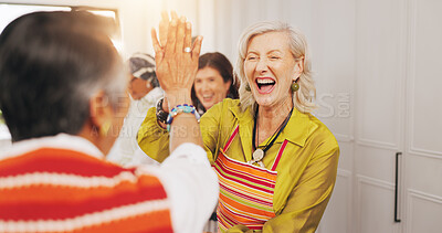 Buy stock photo Cooking class, senior friends and high five in kitchen for recipe success, culinary skills and bonding. Retirement, old women and celebration for meal support, social reunion and hosting dinner party