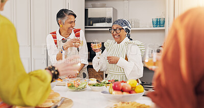 Buy stock photo Cooking, kitchen and mature women with wine for bonding, conversation and culinary lesson. Happy, social reunion and senior friends with alcohol, toast and food for learning recipes together in home