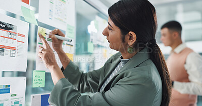 Buy stock photo Woman, sticky note and glass wall for app development, team and documents with review for charts. People, board and planning for brainstorming, software innovation and ux design at digital agency