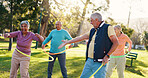 Senior people, park and workout with hoop for active retirement, wellness class or laugh. Elderly friends, ring and fitness outdoor, funny joke or exercise for balance with group for cardio health