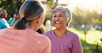 Happy, senior woman and friends for fitness outdoor with discussion, exercise and bonding together. Happy, elderly people and laughing for pilates session, training break and chat of wellness at park