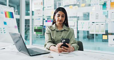 Buy stock photo Business woman, web designer or phone with laptop for planning, strategy or UX in office. Female person, developer or computer on mobile smartphone for app design, UI or testing software in workplace