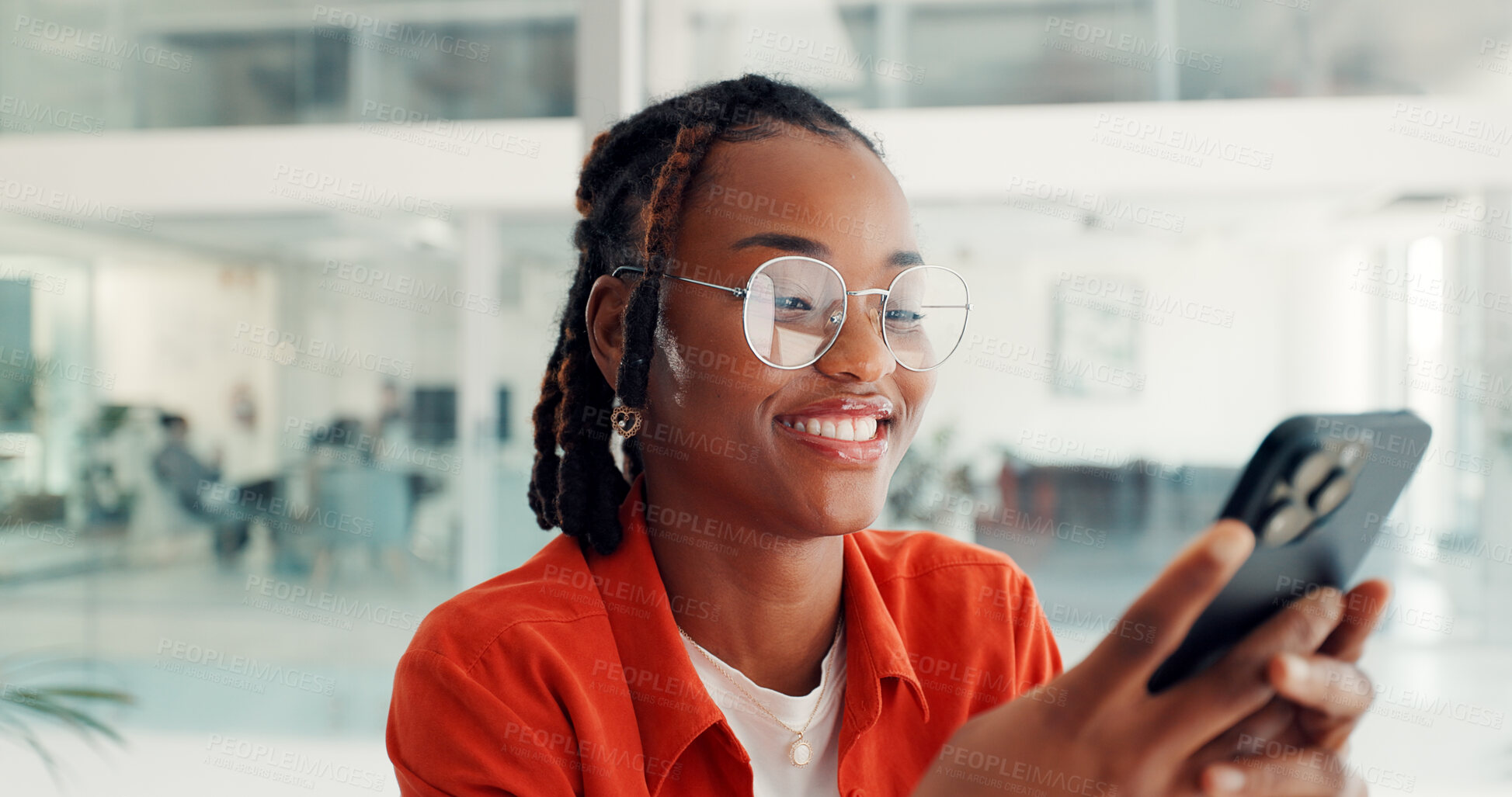 Buy stock photo Typing, businesswoman and happy with phone in office for viral online video, post shares or chat. Social media specialist, black person or smile with smartphone for performance report or client email