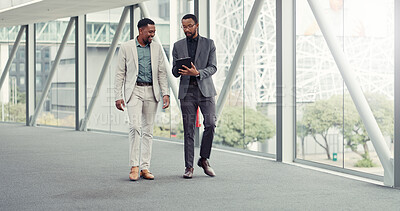 Buy stock photo Hallway, walking and men with tablet, talking and criminal attorney with info for case and teamwork. Reading, research and black people with tech for legal evidence, discussion and planning for trial