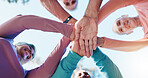 Senior people, hands and stack for collaboration, solidarity or fitness support in outdoor park. Teamwork, happy group and friends together for motivation goals, mission or workout exercise below