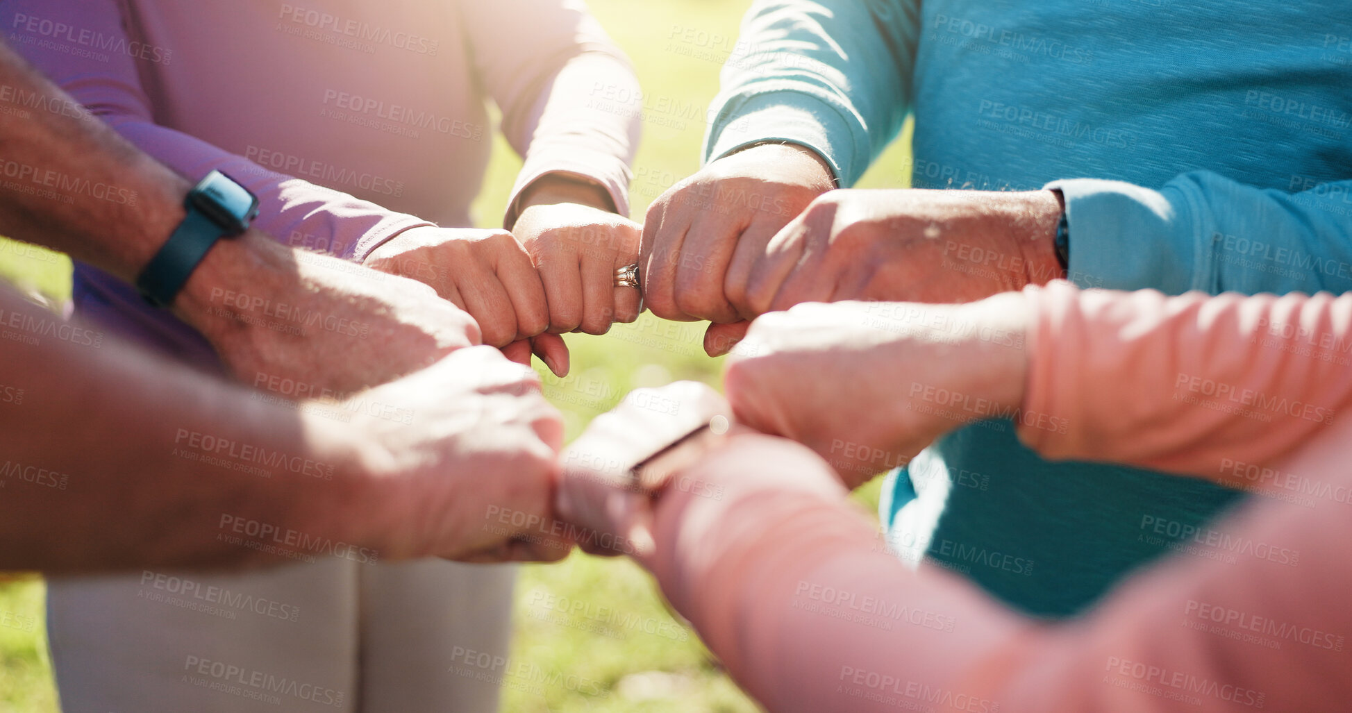 Buy stock photo Senior people, hands together and circle for fitness, solidarity or motivation support in outdoor park. Teamwork, mature group and friends for collaboration goals, mission or workout for exercise