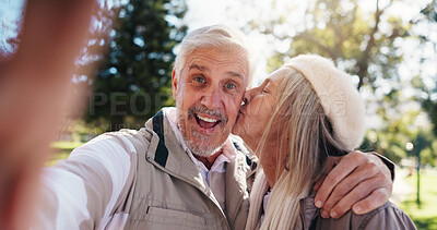 Buy stock photo Portrait, selfie or old couple in park with kiss for connection, commitment or healthy relationship. Happy people, elderly man and senior woman outdoor for hug, love photography and bonding together.
