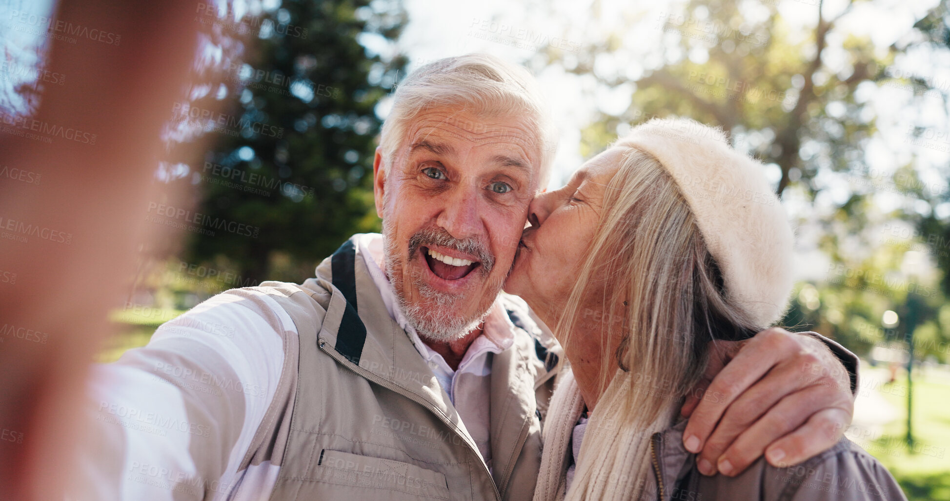 Buy stock photo Portrait, selfie or old couple in park with kiss for connection, commitment or healthy relationship. Happy people, elderly man and senior woman outdoor for hug, love photography and bonding together.