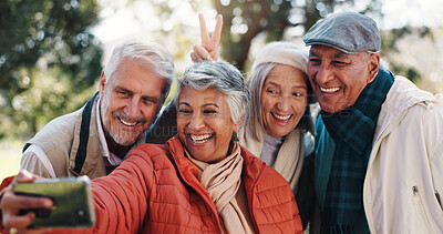 Buy stock photo Elderly friends, selfie and peace sign at park for happy memory or group laugh together. Picture, senior men and women outdoor for funny photo, social media post and v hand gesture in retirement
