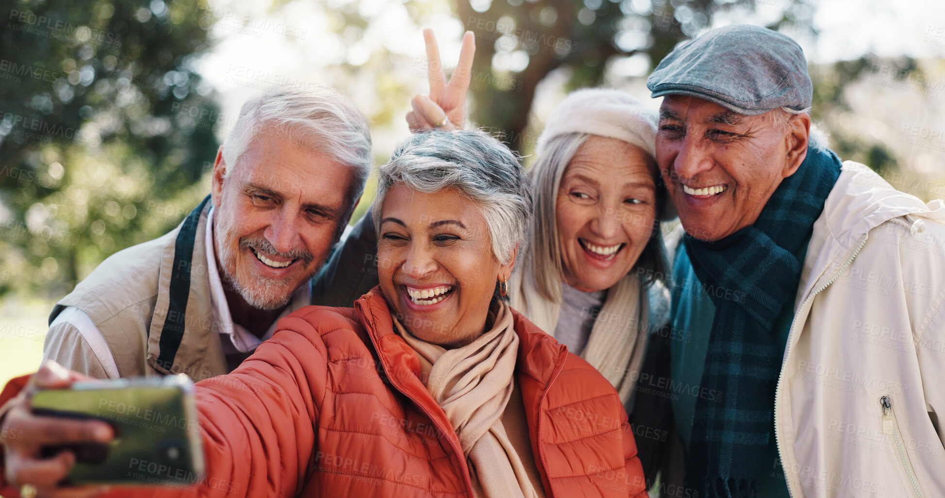 Buy stock photo Elderly friends, selfie and peace sign at park for happy memory or group laugh together. Picture, senior men and women outdoor for funny photo, social media post and v hand gesture in retirement