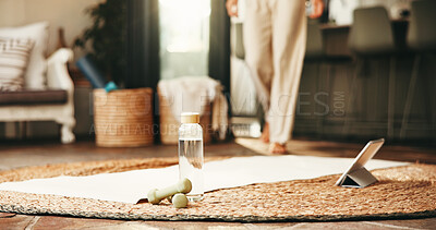 Buy stock photo Water, dumbbells and person with tablet for fitness in home with online tutorial for workout or health. Digital technology, bottle and weights for exercise with yoga mat for equipment in apartment.