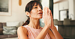 Woman, yoga and meditation with namaste for zen, inner peace or spiritual wellness in home. Active, female person or yogi with calm breathing exercise for awareness, chakra or mindfulness in house