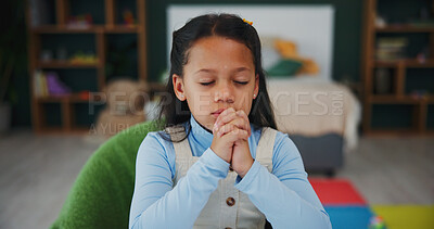 Buy stock photo Girl, child and praying with hope in home for faith, trust or worship of god or belief. Development, kid or christianity with prayer hands or eyes closed for culture, religion or acceptance in house