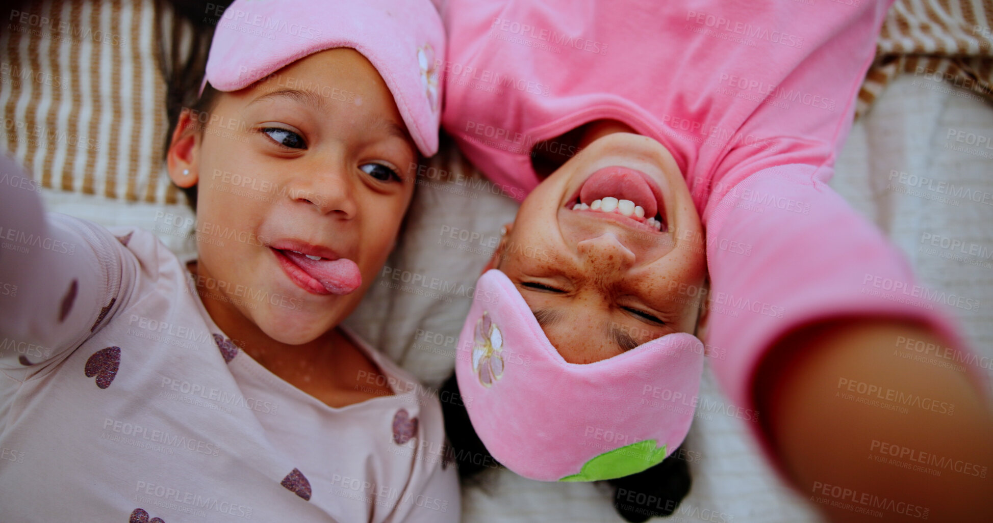 Buy stock photo Selfie, above and funny with kids, sleepover or portrait with memory, girls and bonding together. Home, friends or children with profile picture, happiness or photography with love, humor or laughing