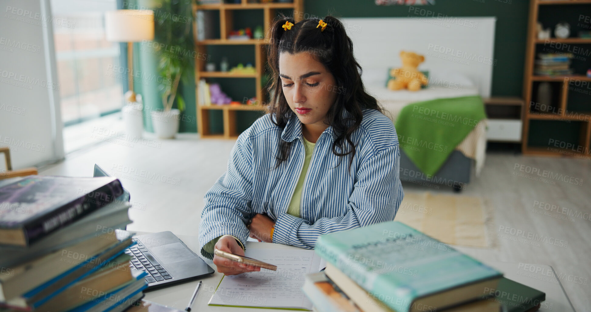 Buy stock photo Books, student and phone with woman in home for college admission, test results and research. Online assessment portal and university project with person in bedroom of house for studying and app