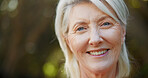 Portrait, smile and relax with old woman in nature for space, summer vacation and retirement. Happiness, peace and wellness with senior person outdoor in park for confidence, weekend break and calm