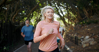 Buy stock photo Running club, senior woman and outdoor fitness, cardio challenge and resilience exercise in nature. Park path, friends and old people with commitment to morning workout, retirement health or wellness