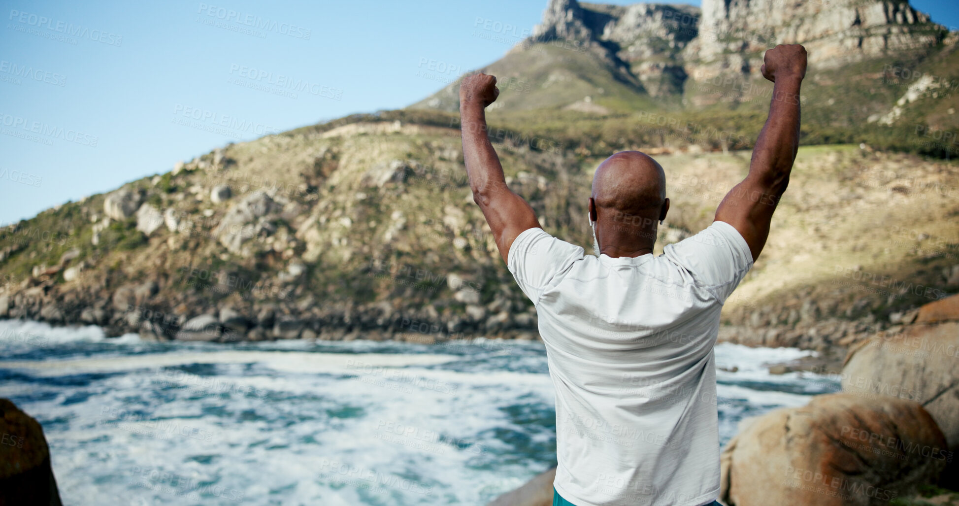 Buy stock photo Runner, beach and celebration with black man for fitness goal, success or win at sea. Back, sports achievement and mature athlete by ocean for workout target, health and earphones for music outdoor