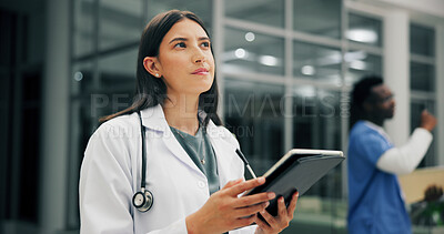 Buy stock photo Tablet, doctor thinking and woman in hospital for healthcare, report or idea in clinic at night. Technology, medical worker and person planning, problem solving or decision for schedule on overtime