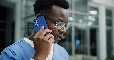 Buy stock photo Phone call, reading and nurse or black man in hospital for ward clerk, icu emergency and medical records at night. Healthcare administration, surgery schedule and contact with person for overtime