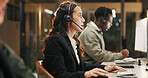 Woman, call center and support with headset at night for customer service or consulting at office. Female person, employee or agent talking for communication, helpdesk and overtime at workplace