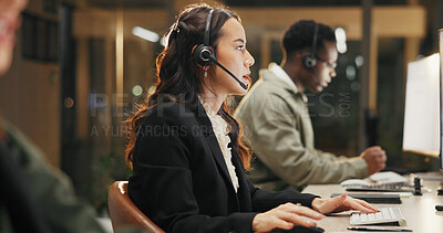 Buy stock photo Woman, call center and support with headset at night for customer service or consulting at office. Female person, employee or agent talking for communication, helpdesk and overtime at workplace
