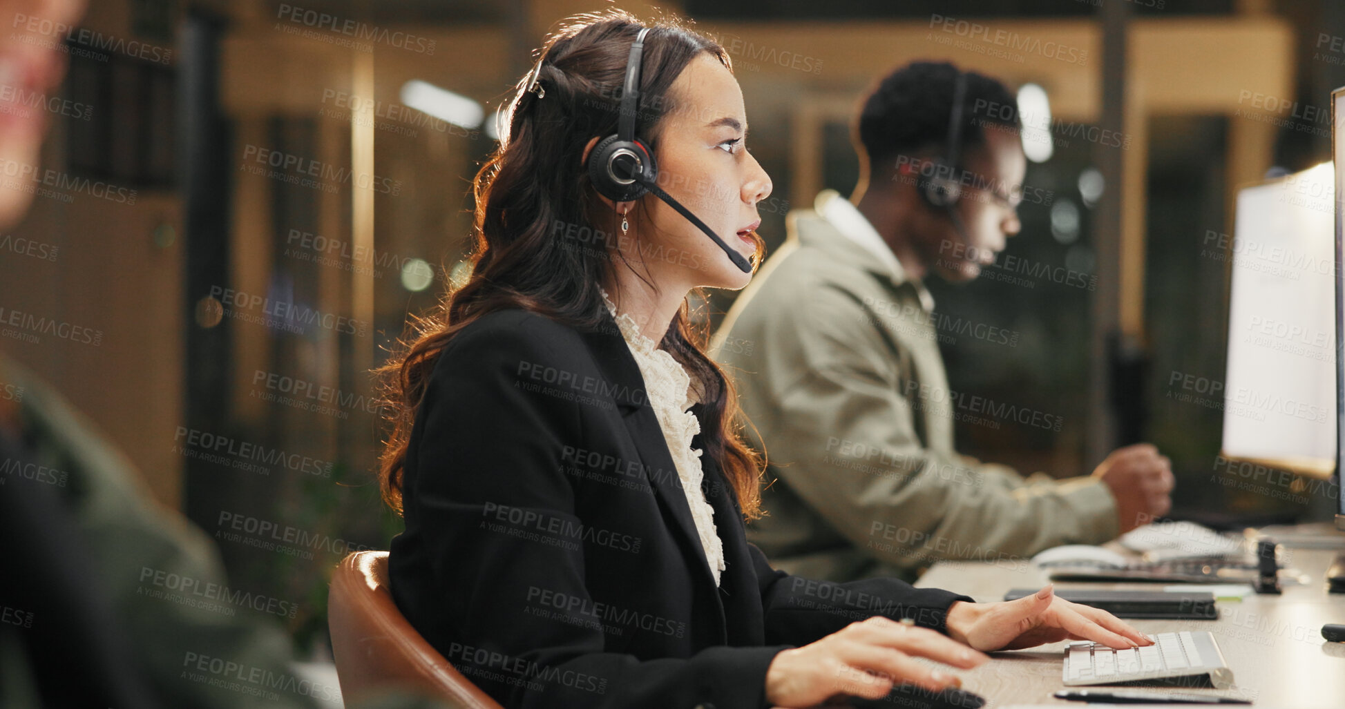 Buy stock photo Woman, call center and support with headset at night for customer service or consulting at office. Female person, employee or agent talking for communication, helpdesk and overtime at workplace