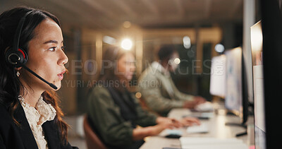 Buy stock photo Woman, call center and helpdesk with headset at night for customer service or consulting at office. Female person, employee or agent talking for communication, typing and overtime at workplace