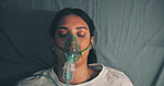 Surgery, anesthesia and woman with oxygen mask, recovery and operation in hospital bed. Female person, medical patient and breathing equipment for coma, cardiology or emergency with ventilation