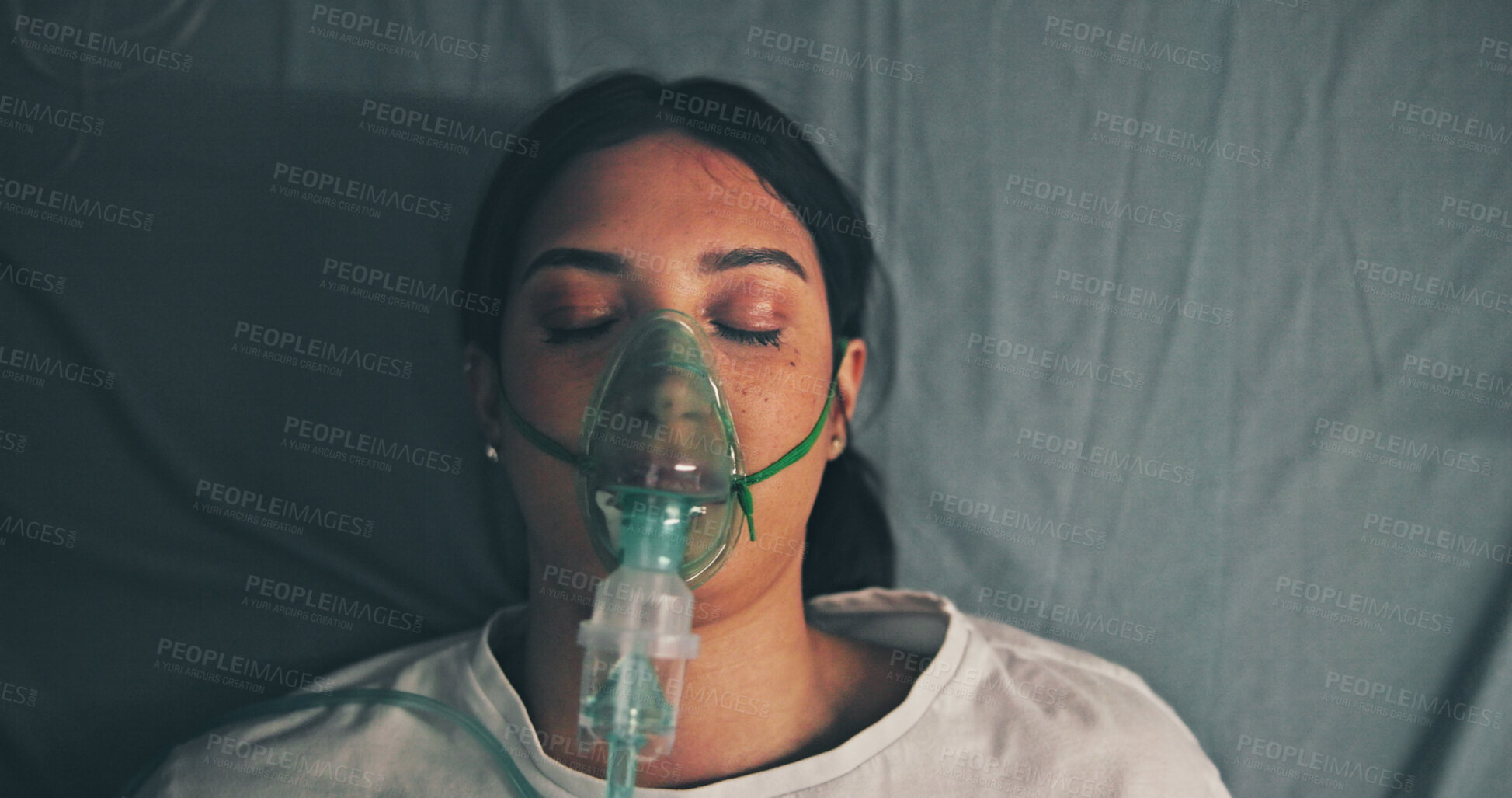 Buy stock photo Surgery, anesthesia and woman with oxygen mask, recovery and operation in hospital bed. Female person, medical patient and breathing equipment for coma, cardiology or emergency with ventilation