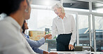 Business people, meeting or women with handshake in office, investment contract or partnership. Company acquisition, deal negotiation or employees shaking hands for agreement, merger success or flare