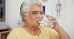 Drink, water and senior woman in clinic for medical consultation with hydration for recovery. Healthcare, vitamins and elderly person with electrolytes, tablets or supplements with h2o for wellness