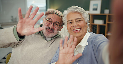 Buy stock photo Senior couple, video call and wave in home with pov, smile and contact with hello in lounge. Elderly people, happy and greeting with virtual chat web, social media and portrait in retirement at house