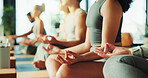 People, hands or relax in yoga class with lotus pose for meditation, chakra healing or wellness. Zen, group or yogi in health studio with mindfulness exercise for inner peace, gratitude or awareness.