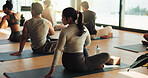 Back, fitness and people in yoga studio together for morning session or holistic health course. Exercise, getting ready and stretching with yogi group in wellness class for awareness or balance