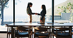 Office, business women and shaking hands for welcome, greeting or introduction. People, handshake or happy workers in meeting for negotiation, b2b deal or thank you for partnership with collaboration