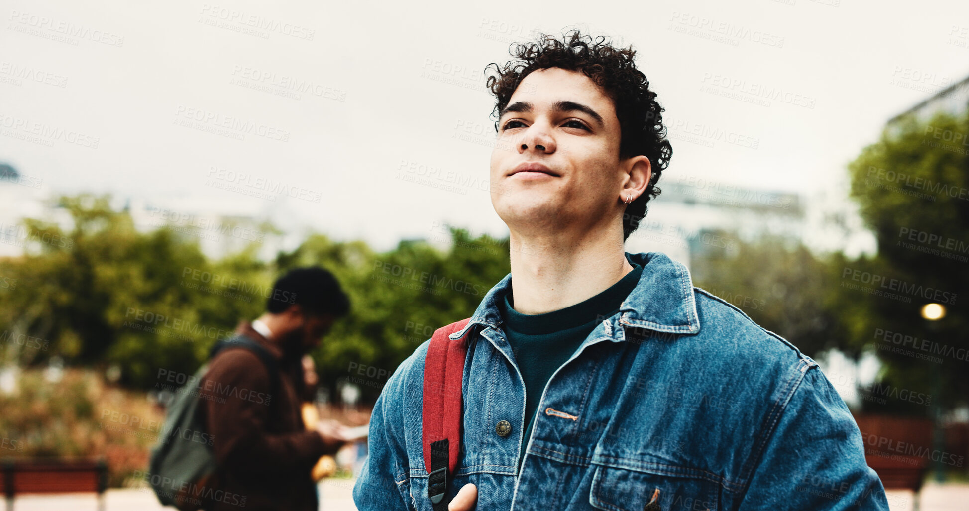 Buy stock photo Outdoor, student and man on campus, thinking and education for skill development, learn or knowledge. Future, reflection and person with scholarship for opportunity, vision and studies at university