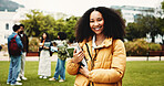 Portrait, student or woman on campus with textbook for college scholarship, education or english degree. Happy, person outdoor or books at university for literature study, knowledge or academic goals