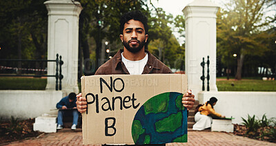 Buy stock photo Portrait, protest and man with poster, climate change and university with sustainability. Outdoor, person or activist with cardboard, global warming awareness or save earth with demonstration or sign