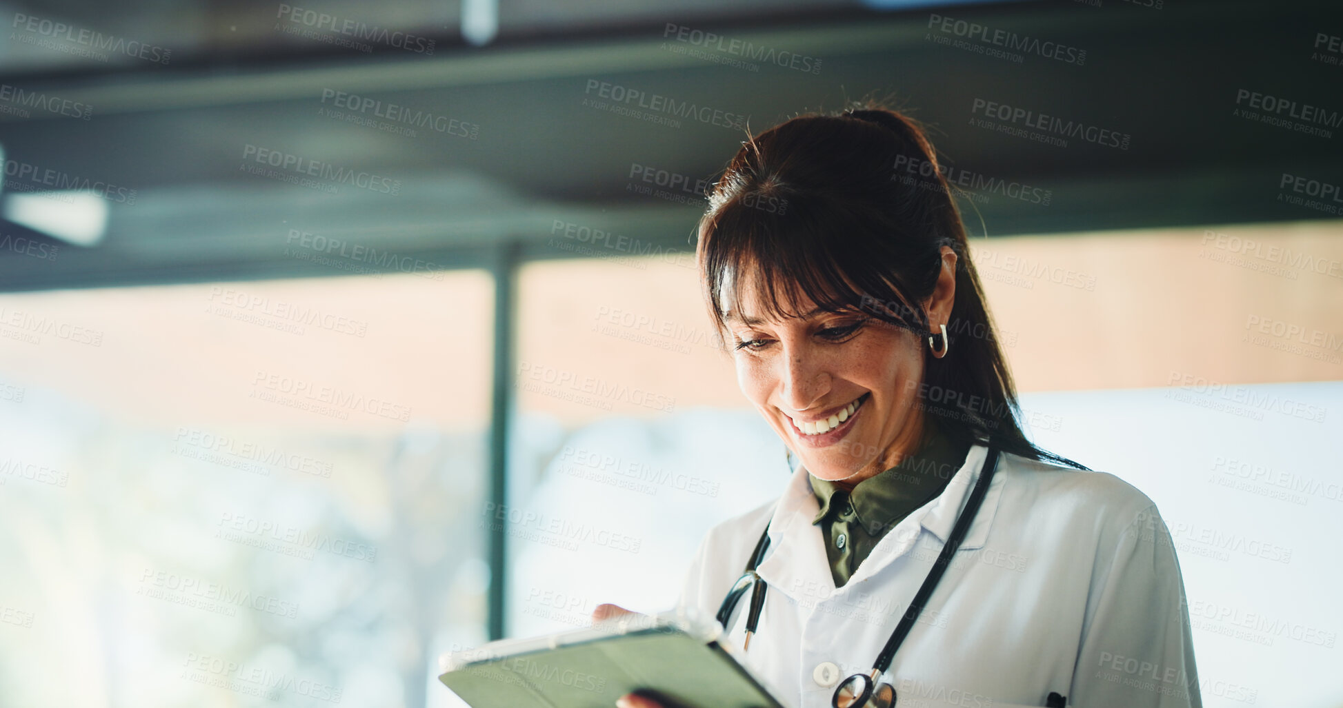 Buy stock photo Happy, doctor and woman with tablet for medical info, patient history or telehealth in clinic. Tech, healthcare and mature person in hospital with insurance records, wellness email or research