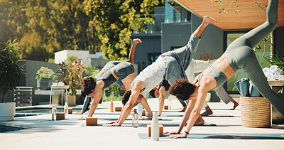 Buy stock photo Yoga, stretching and fitness for group, class and routine to improve posture, healthy or endurance. Outdoor, people and balance for downward facing dog at wellness retreat, self awareness or flexible