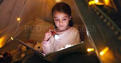 Buy stock photo Kid, torch and reading book in tent at night for fairytale, bedtime storytelling and literature. Child, flashlight and fantasy novel with folklore story, imagination and language development at house