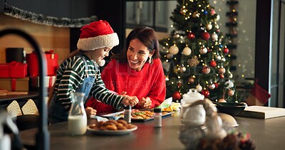 Buy stock photo Christmas, mother and child baking cookies in kitchen, learning and help with parent on holiday. Xmas, happy mom and bake with girl, sprinkles or teaching with preparation of festive food in home