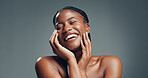 Beauty, laugh or black woman in studio for skincare, facial glow or soft texture for wellness. Dermatology, natural aesthetic or happy person with smooth skin, self care or space on gray background