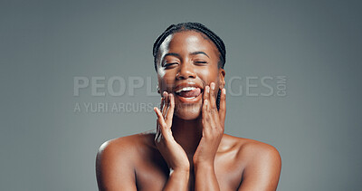 Buy stock photo Portrait, skincare and black woman in studio, funny and dermatology on gray background. Space, tongue out and African person with beauty, glow and grooming with cosmetics, healthy skin and aesthetic