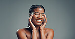 Beauty, black woman and smile with skincare in studio for healthy skin, natural glow and radiance. Mockup space, person and portrait on gray background for hydration treatment results and dermatology