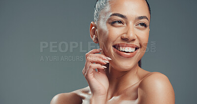 Buy stock photo Smile, skincare and hands with woman in studio for beauty, self care and clear skin. Glow, dermatology and hydration with female person on gray background space for shine, aesthetic and collagen